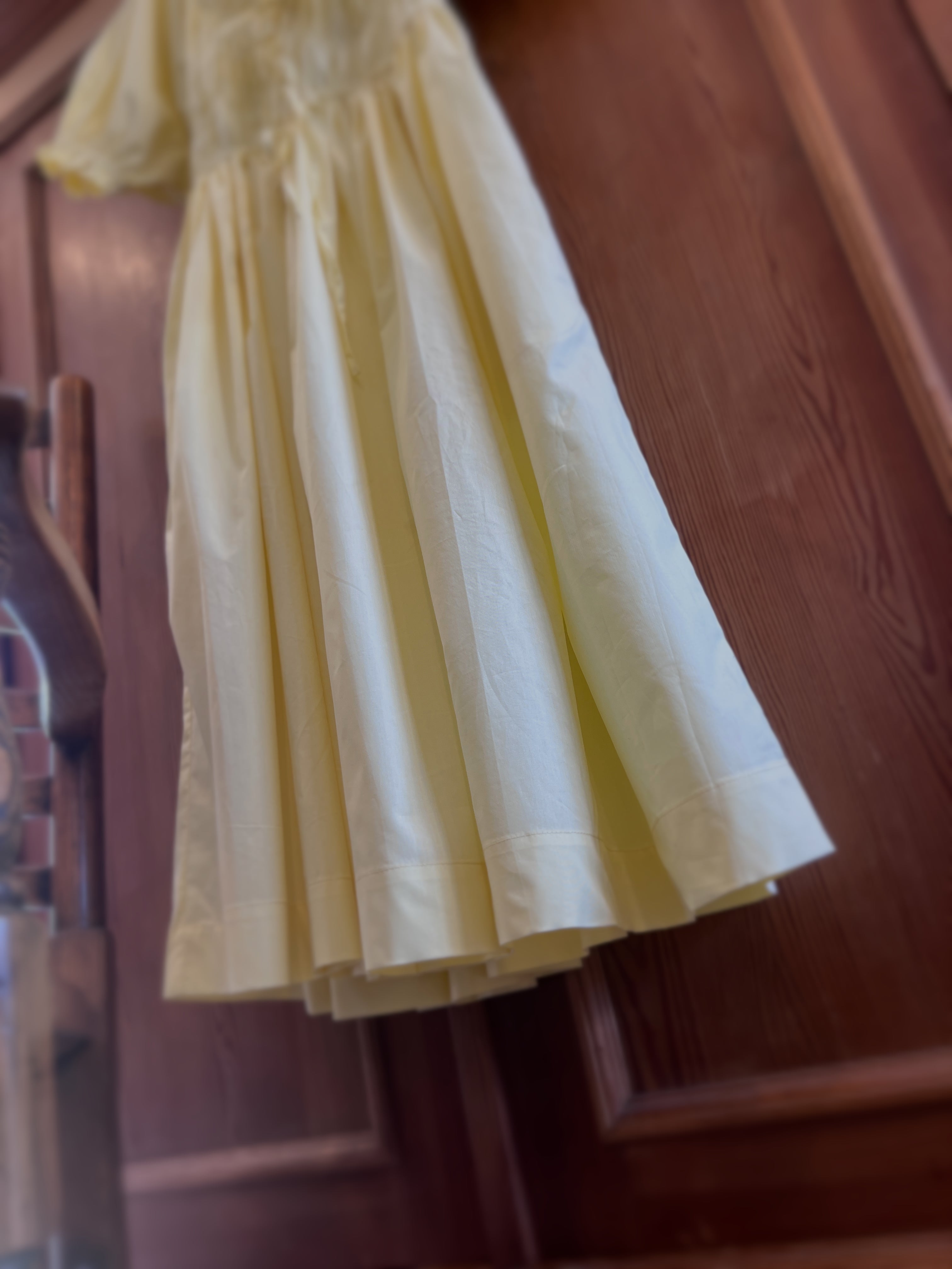 Elle boheme made in new zeland freewind dawn pure cotton midi dress in butter yellow colour vintage inpired skirt featuring a wide botton hem.
